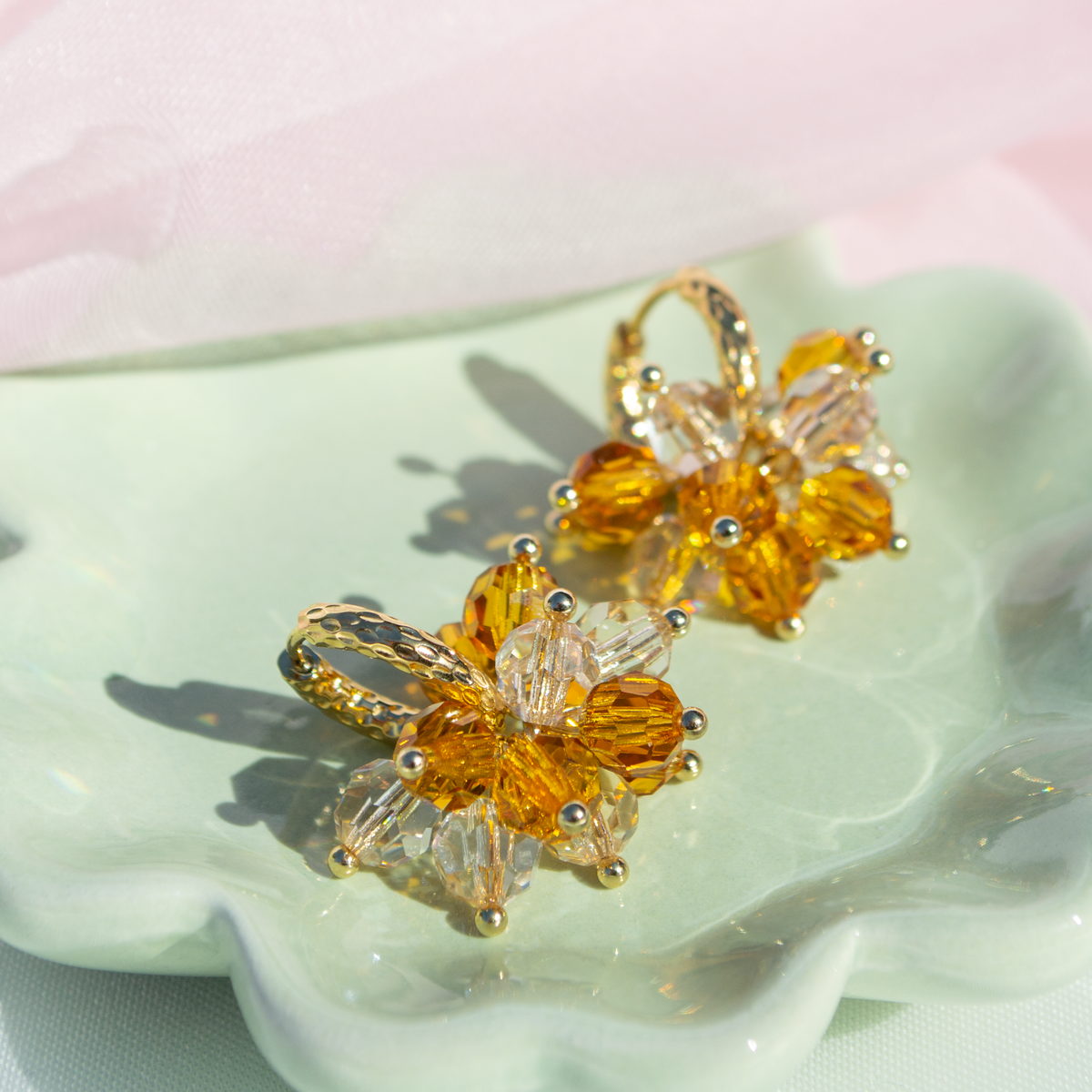 Pom Pom earrings with a gold ring, different colors