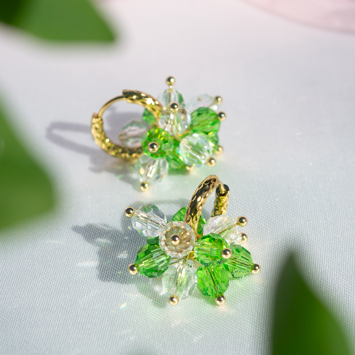 Pom Pom earrings with a gold ring, different colors