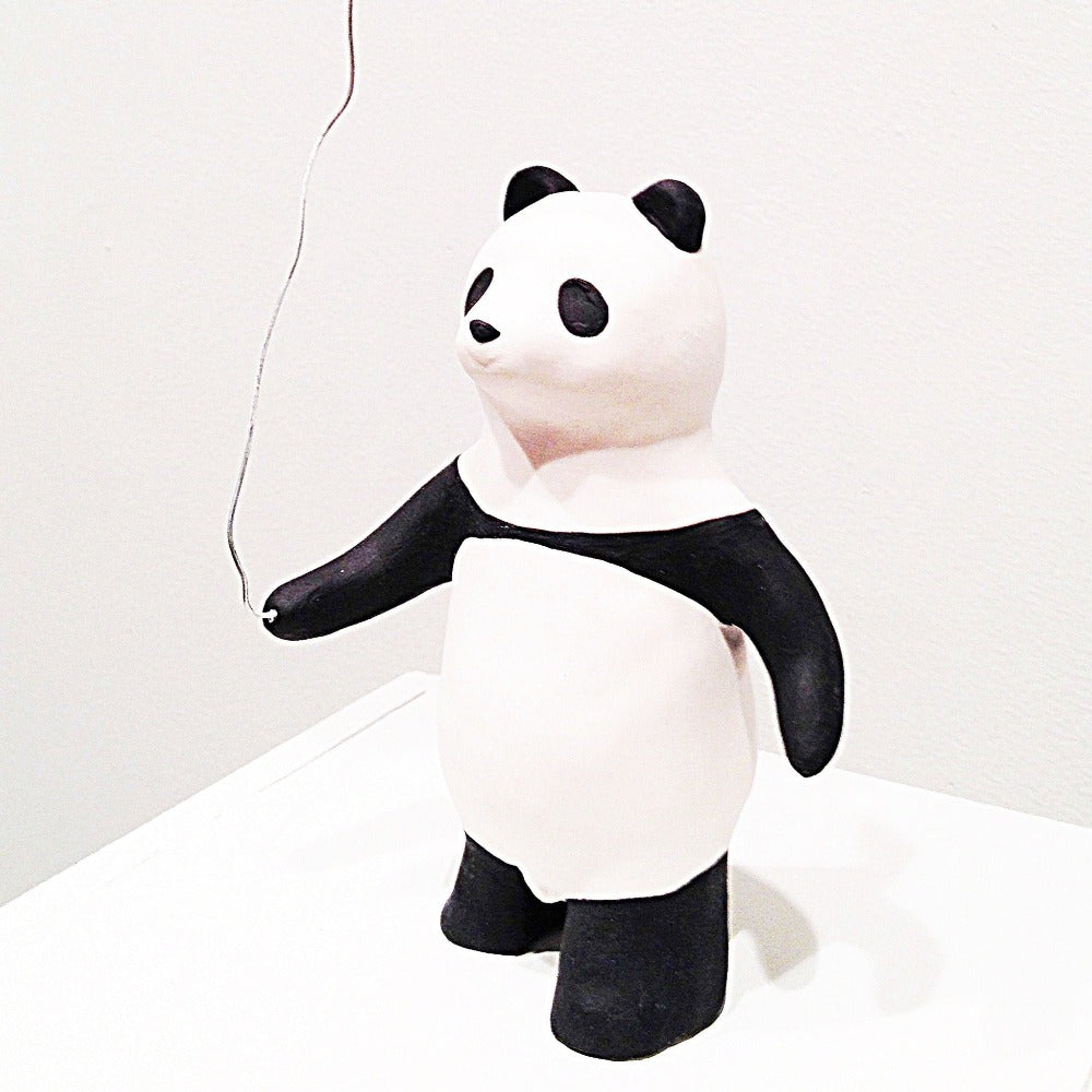 panda pinkin ilmapallon kera