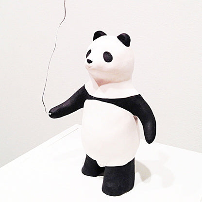panda pinkin ilmapallon kera
