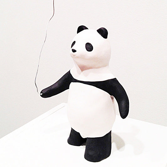 panda pinkin ilmapallon kera